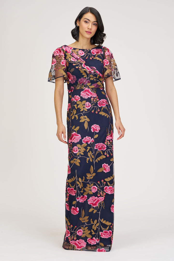 Woman wearing a floral dress on a white background