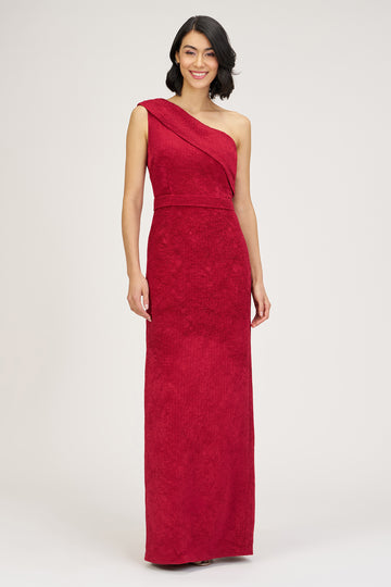 Woman wearing a red one-shoulder dress on a white background